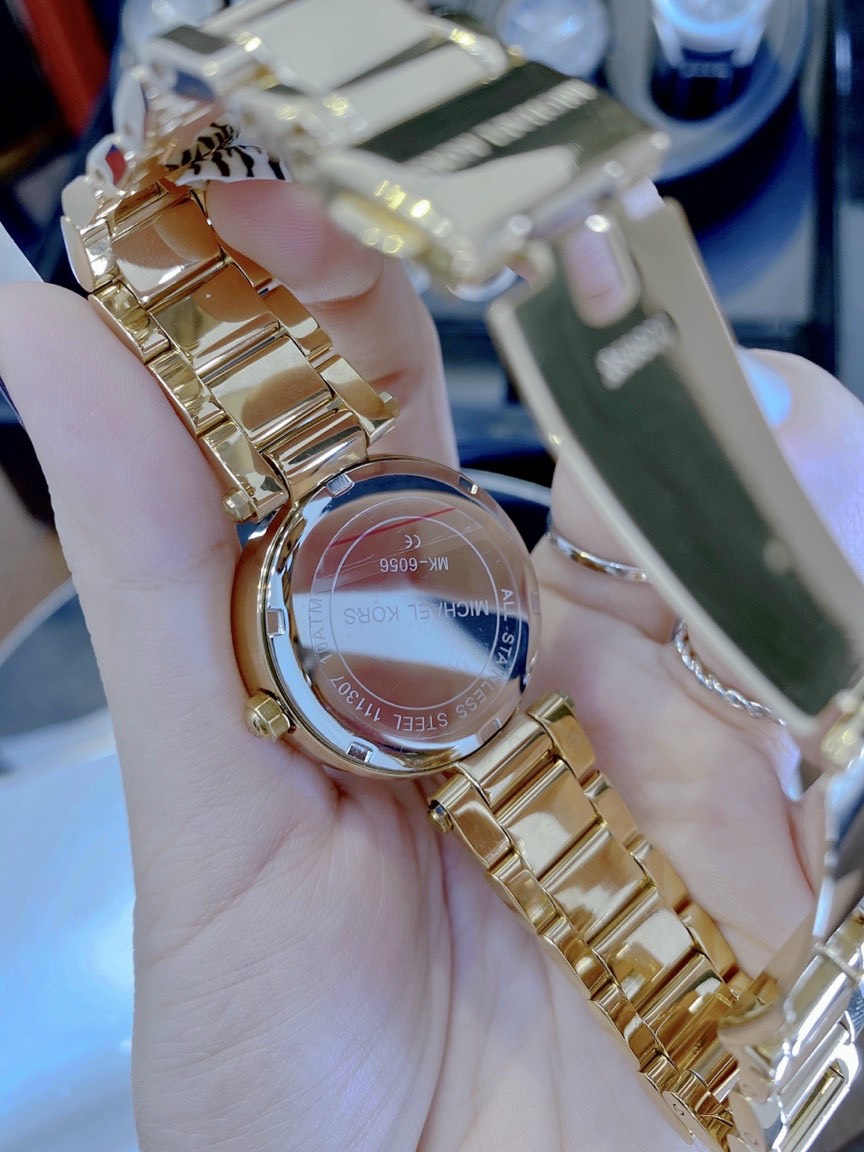 Đồng hồ Michael Kors nữ dây kim loại Đồng hồ Michael Kors nữ dây kim loại