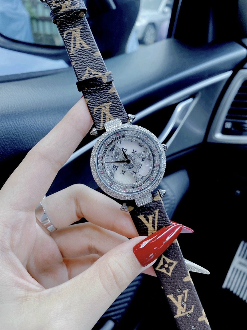 Đồng hồ Louis Vuitton nữ mặt tròn đính đá Đồng hồ Louis Vuitton nữ mặt tròn đính đá