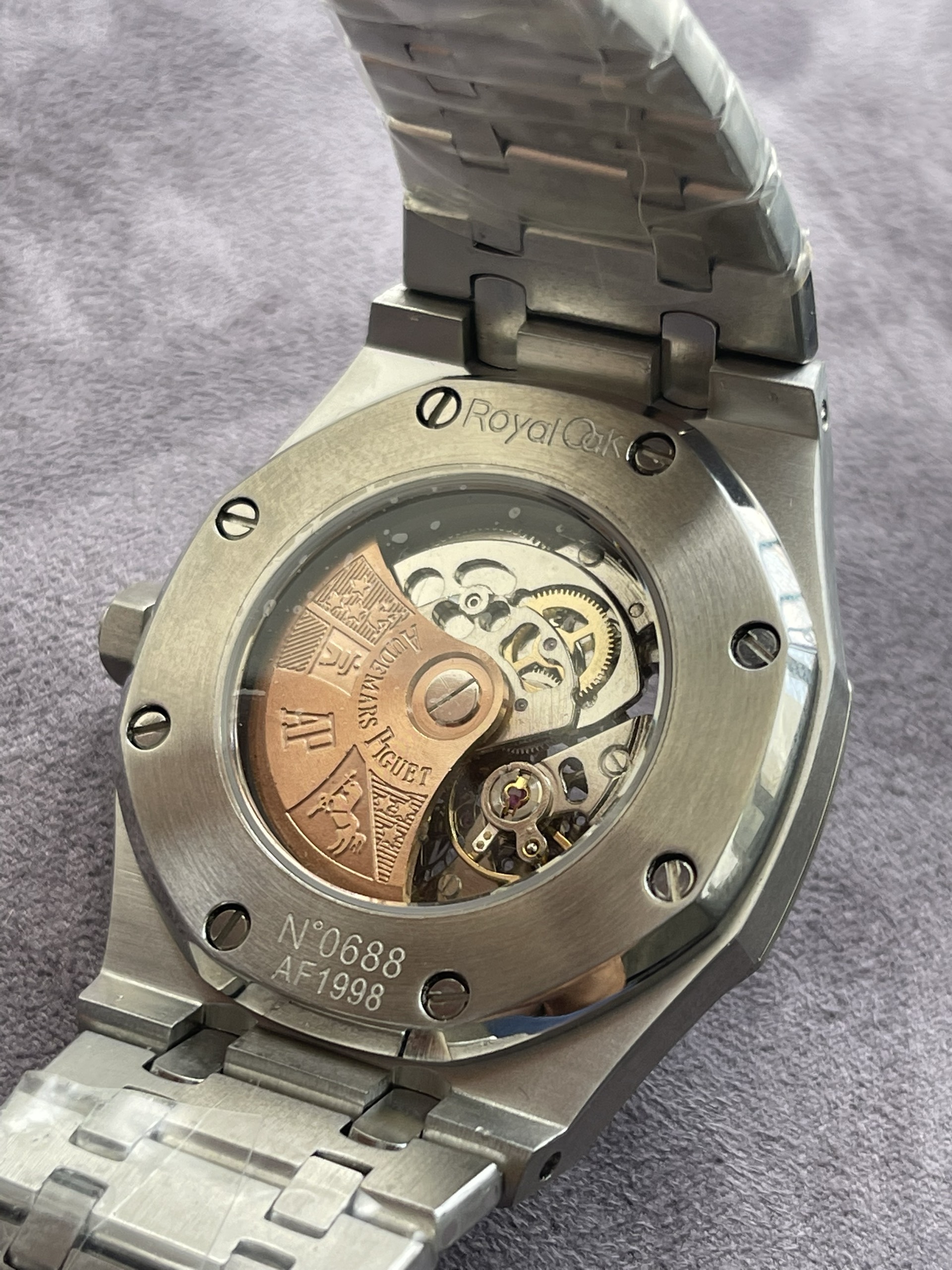 Đồng hồ Audemars Piguet cơ lộ máy vỏ phủ bạch kim trắng Fake 11 Đồng hồ Audemars Piguet cơ lộ máy vỏ phủ bạch kim trắng Fake 11