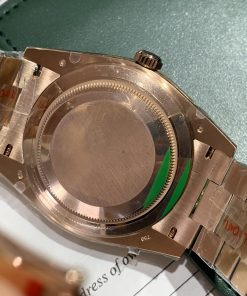 Đồng hồ Rolex Day-Date Replica 11 cọc số Ruby niềng đá baguette 40mm