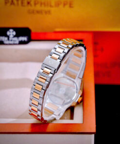 Đồng hồ đeo tay nữ đẹp Patek Philippe Nautilus demi đính đá fake cao cấp 32mm