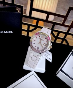 Đồng hồ Coach Ceramic Rainbow Crystal Bezal nữ máy Quartz Nhật Like auth 36mm