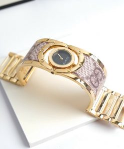 Đồng hồ Gucci nữ dạng lắc tay màu vàng sang trọng mặt đen (2)