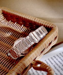 Đồng hồ Patek Philippe Nautilus nữ niềng đá mặt tím Fake cao cấp 35mm (4)