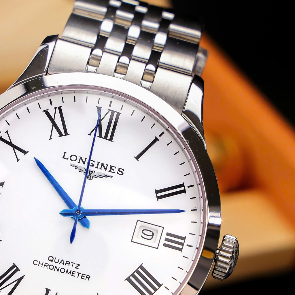 Đồng hồ Longines Record mặt trắng cọc số la mã dây kim loại Fake 11 40mm