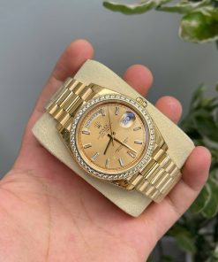 Đồng hồ Fake 11 Rolex Day-Date mặt vàng champagne đính đá 40mm (2)