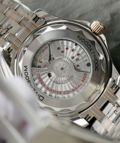 Đồng hồ Omega Seamaster Fake 11 Thuỵ Sỹ demi vàng hồng mặt đen 42mm (2)