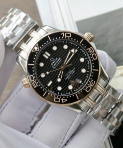 Đồng hồ Omega Seamaster Fake 11 Thuỵ Sỹ demi vàng hồng mặt đen 42mm (2)