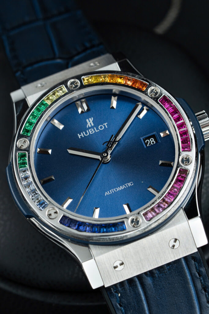 Đồng hồ Hublot Classic Fusion Rep 11 đính đá ruby 7 màu mặt xanh blue xưởng JJF 42mm (2)