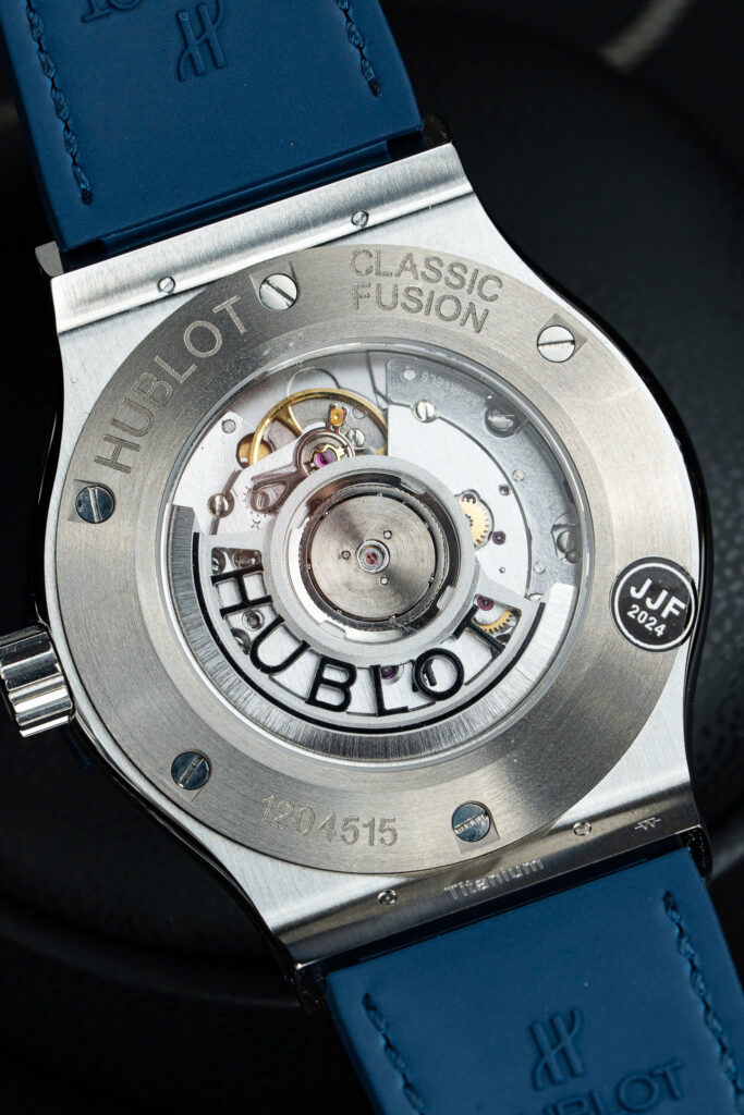 Đồng hồ Hublot Classic Fusion Rep 11 đính đá ruby 7 màu mặt xanh blue xưởng JJF 42mm (2)
