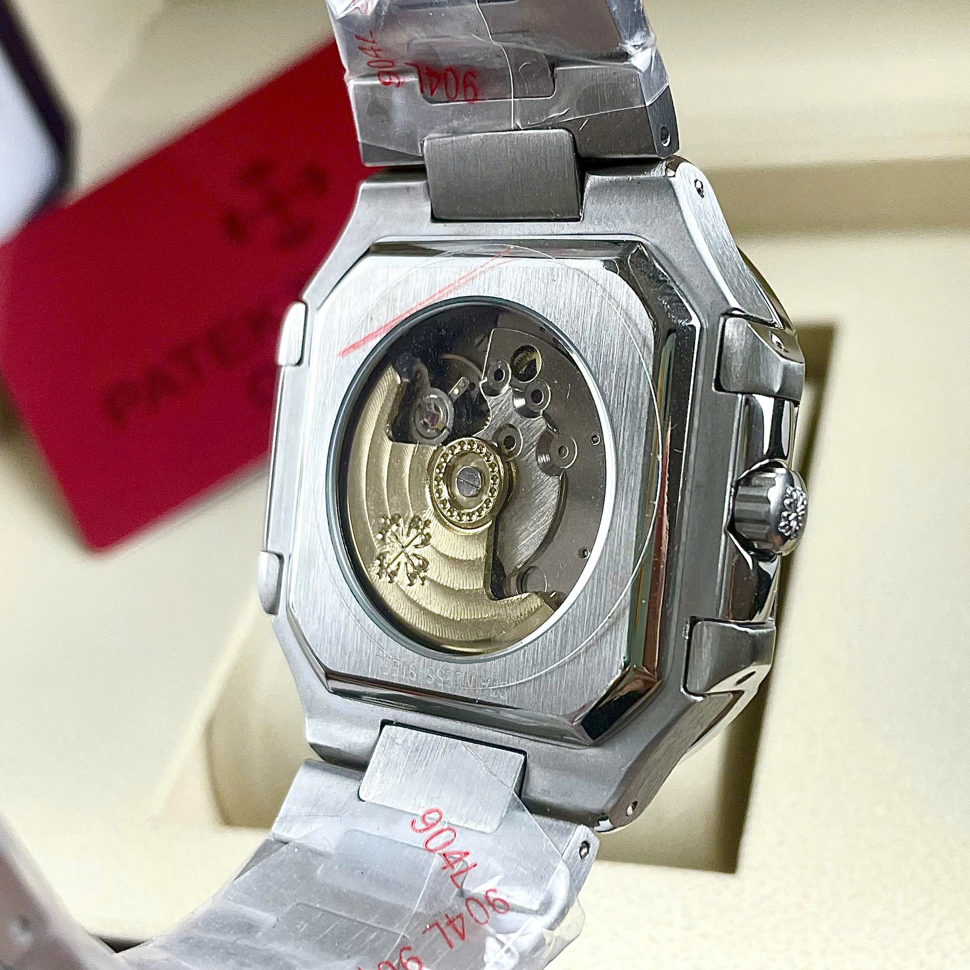 Đồng hồ Patek Philippe 58211A Cubitus mặt đỏ máy cơ nhật giá rẻ fake cao cấp 43mm (2) Đồng hồ Patek Philippe 5821/1A Cubitus mặt đỏ máy cơ nhật giá rẻ fake cao cấp 43mm