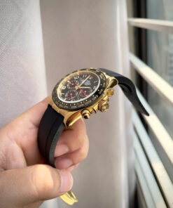 Đồng hồ Rolex Daytona Cosmograph vàng gold mặt đen cọc số học trò fake 11 40mm