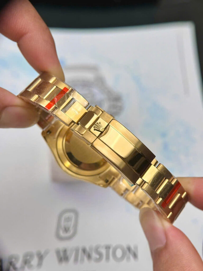 Đồng hồ Rolex Daytona Cosmograph nam vàng gold mặt xanh băng fake cao cấp 40mm