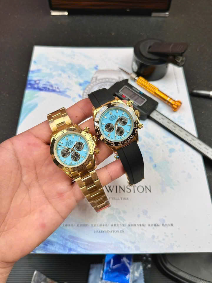 Đồng hồ Rolex Daytona Cosmograph nam vàng gold mặt xanh băng fake cao cấp 40mm
