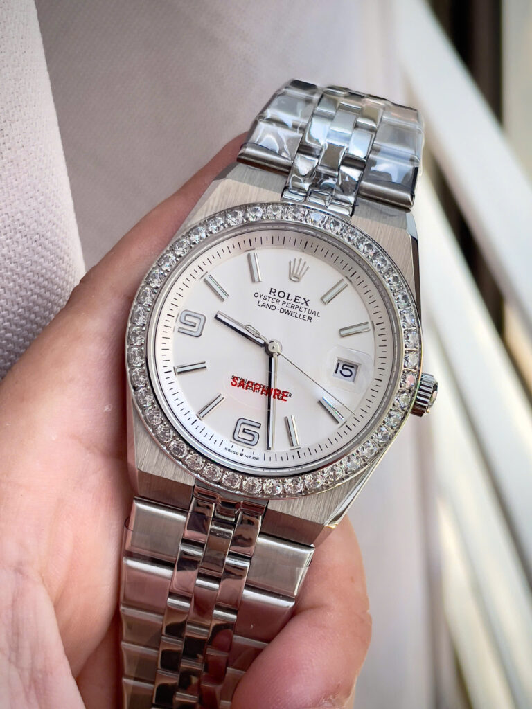 Đồng hồ Rolex fake 11 Land – Dweller nam cọc số dạ quang đính đá 41mm