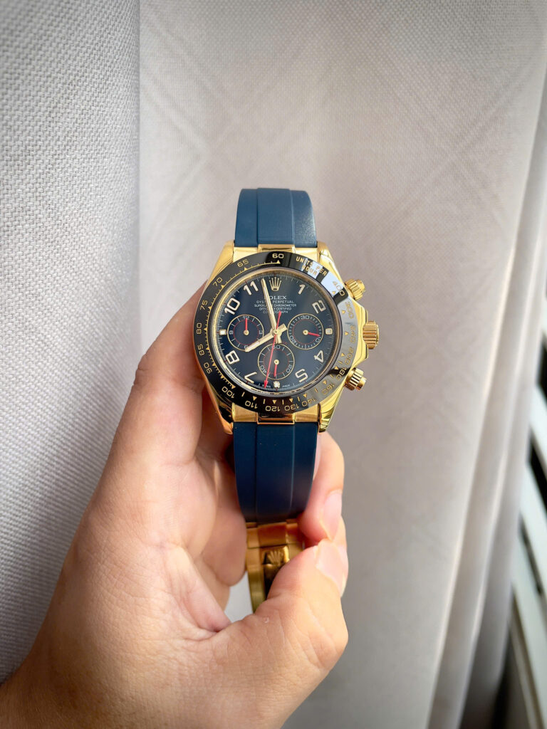 Đồng hồ Rolex Daytona Cosmograph vàng gold dây cao su xanh fake 11 40mm