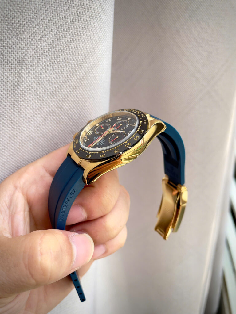 Đồng hồ Rolex Daytona Cosmograph vàng gold dây cao su xanh fake 11 40mm