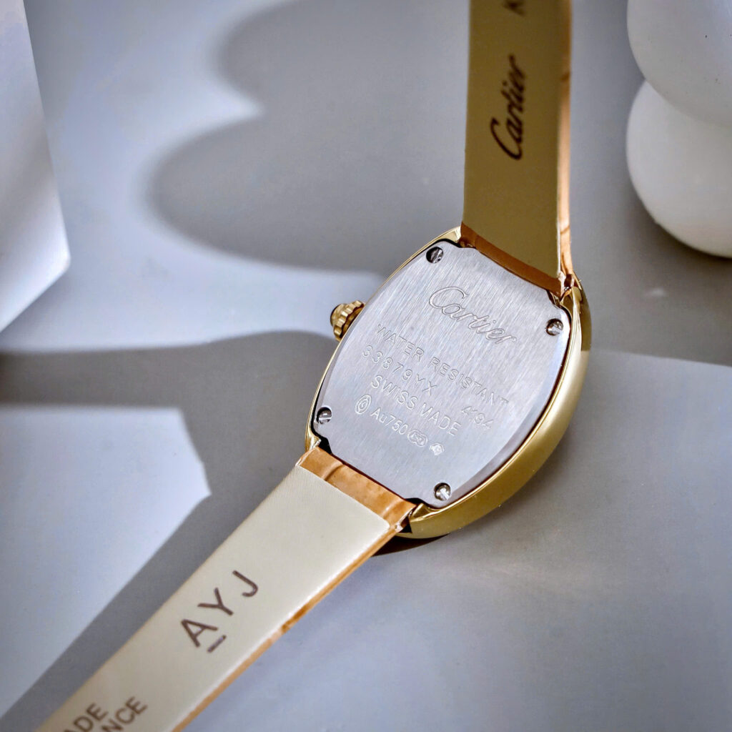 Đồng hồ Cartier Baignoire nữ WGBA0022 vàng gold dây da nâu fake cao cấp 23x31mm