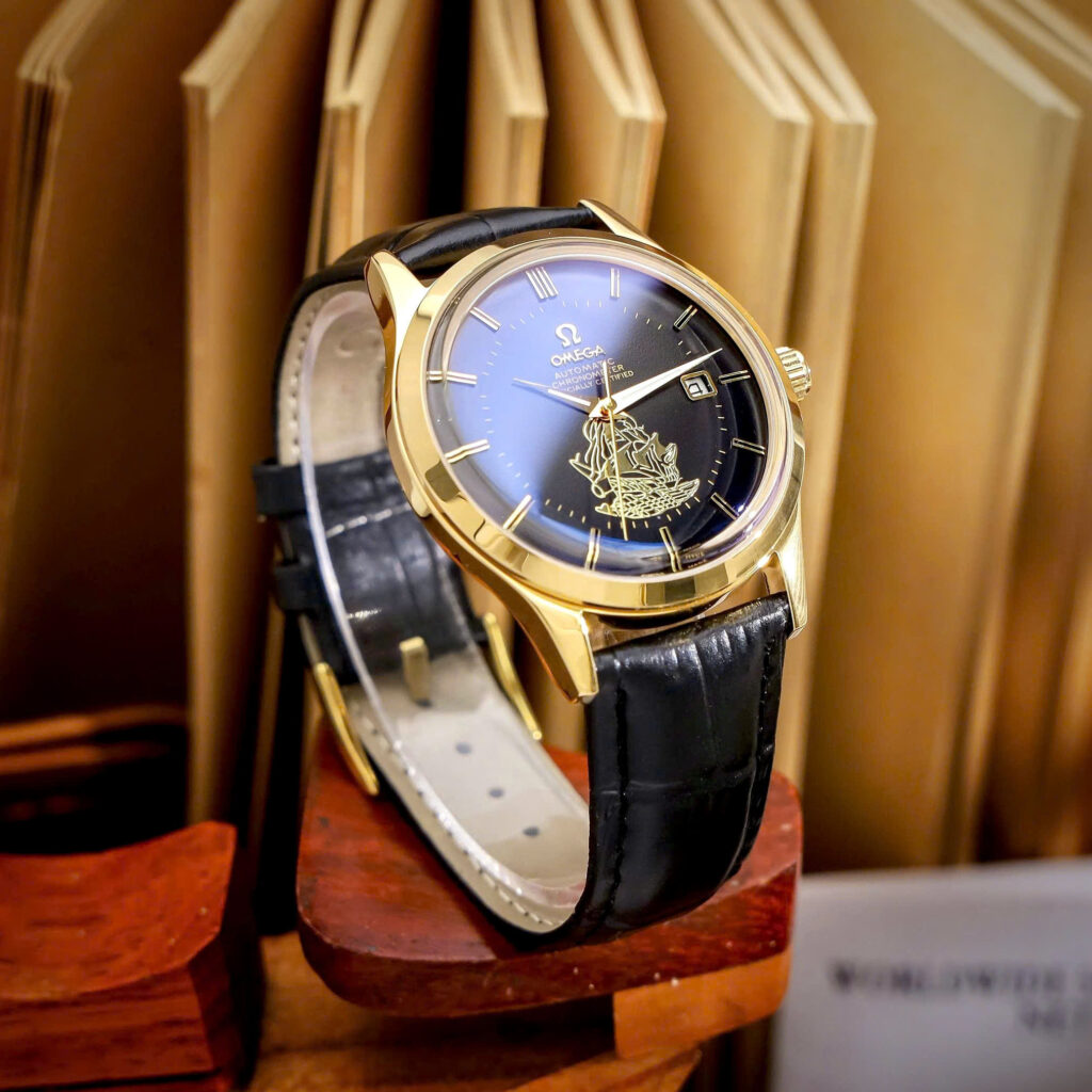 Đồng hồ Omega thuyền buồm vàng gold mặt đen máy cơ nhật giá rẻ 40mm