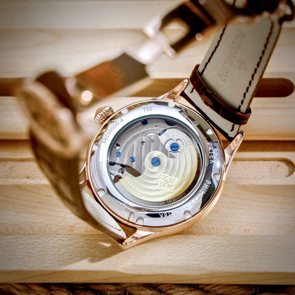 Đồng hồ Patek Philippe Genève nam vàng gold lộ cơ Tourbillon fake cao cấp 43mm