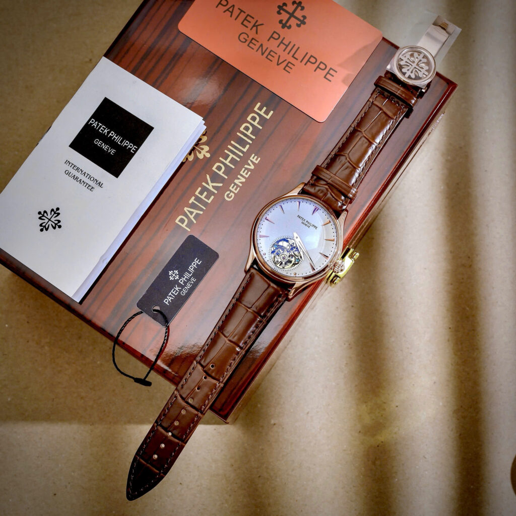 Đồng hồ Patek Philippe Genève nam vàng gold lộ cơ Tourbillon fake cao cấp 43mm