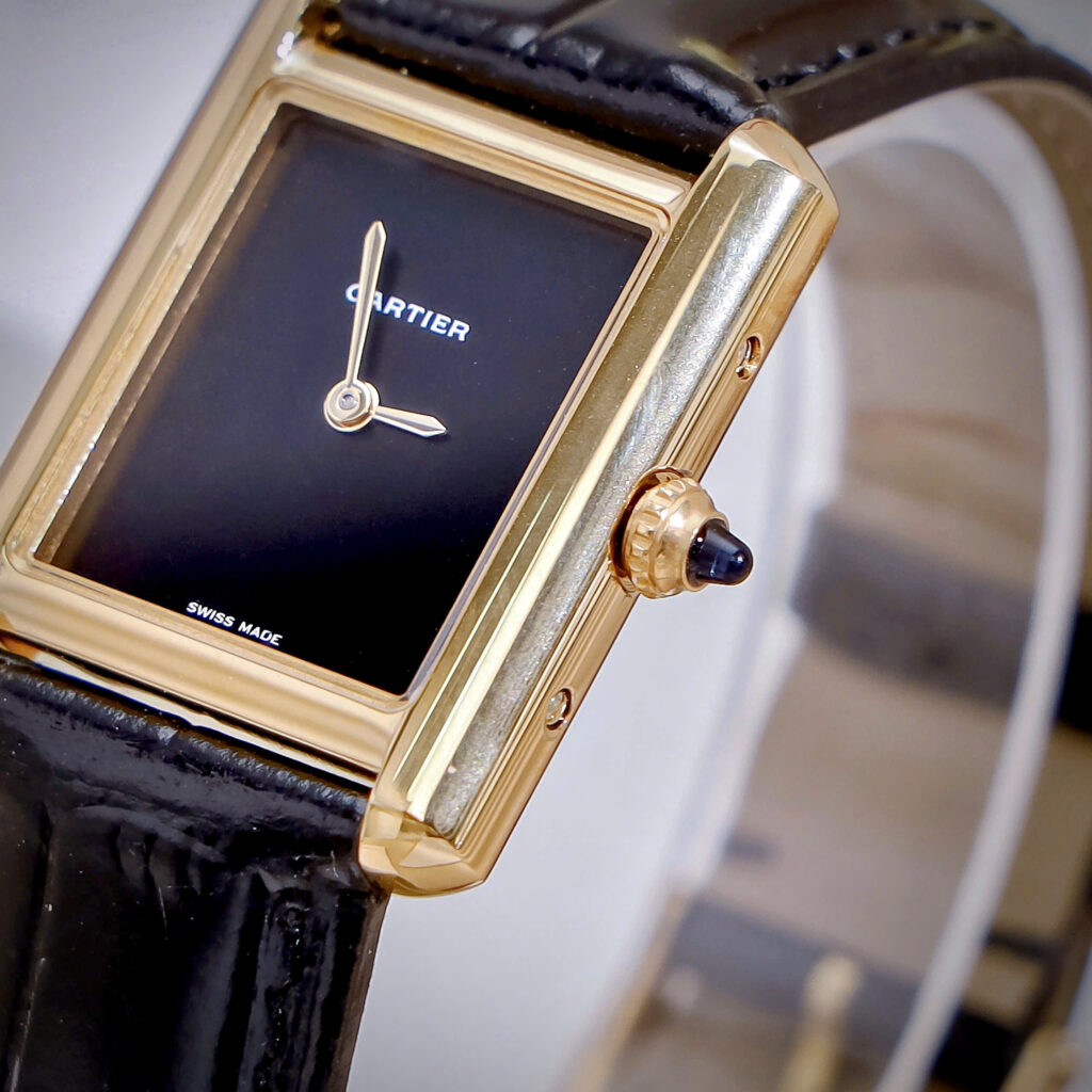 Đồng Hồ Cartier Tank Louis Nữ Vàng Gold Dây Da Đen Fake Cao Cấp 24x32mm