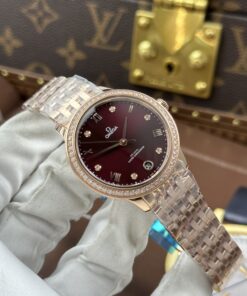 Đồng hồ nữ Omega De Ville Prestige Rep 11 mặt số màu đỏ đô dây kim loại 34mm (2)